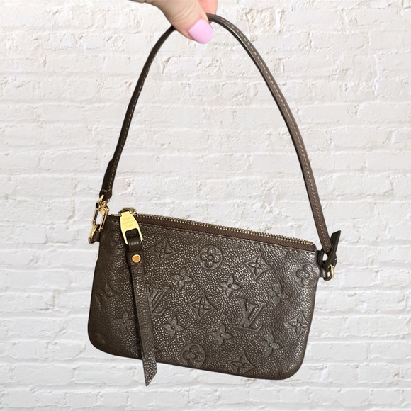 Like ๐ Louis Vuitton Empriente Citadine leather muted taupe mini pouch wristlet - Picture 1 of 17